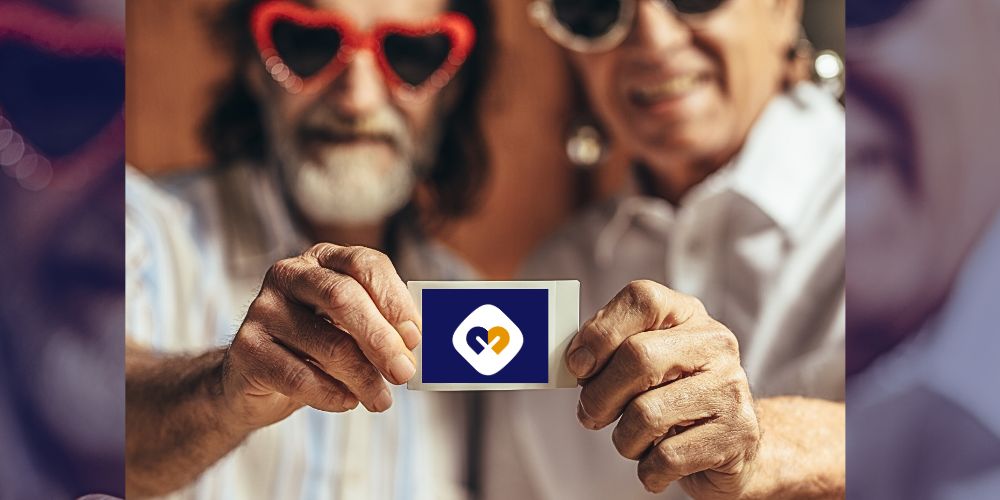 two friends holding a card